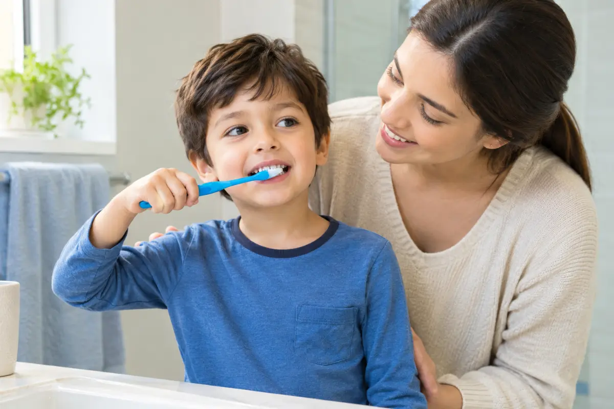 How to brush kids’ teeth safely with fluoride toothpaste under adult supervision